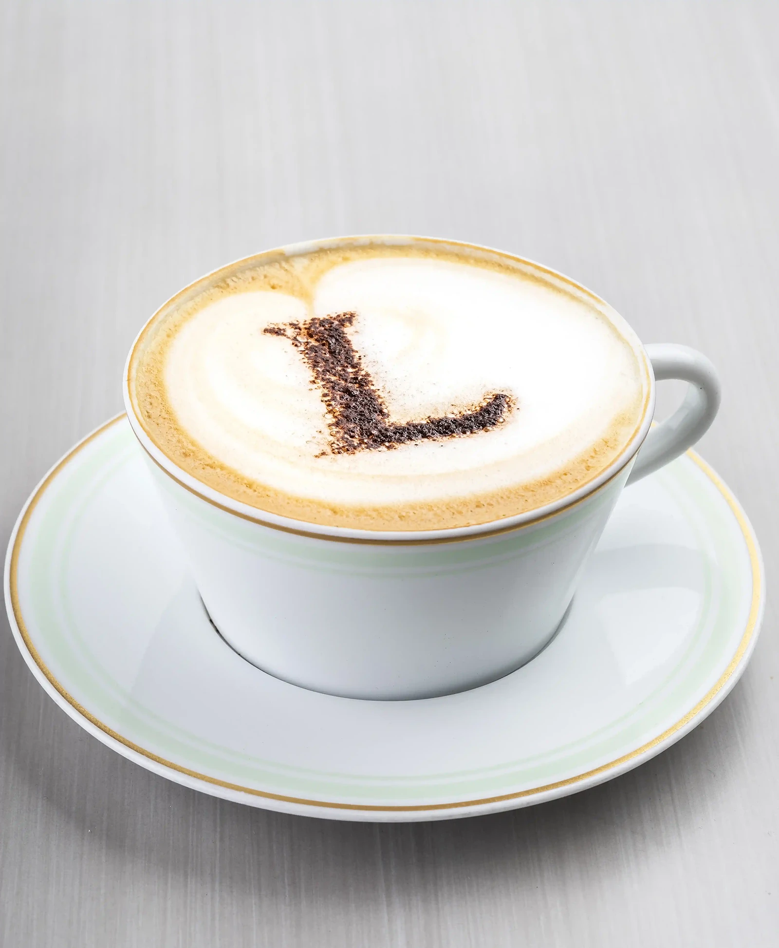 A cappuccino cup with a perfect foam top.