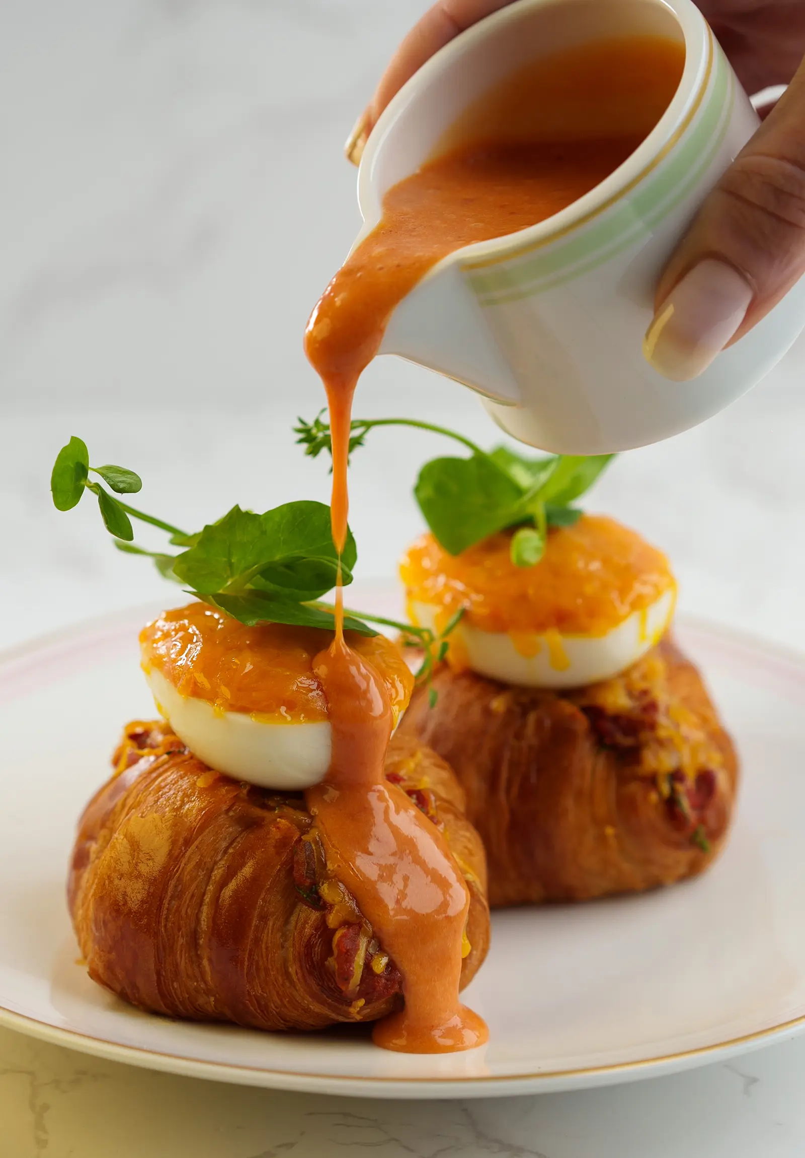 A savory croissant with a shakshouka-style filling.
