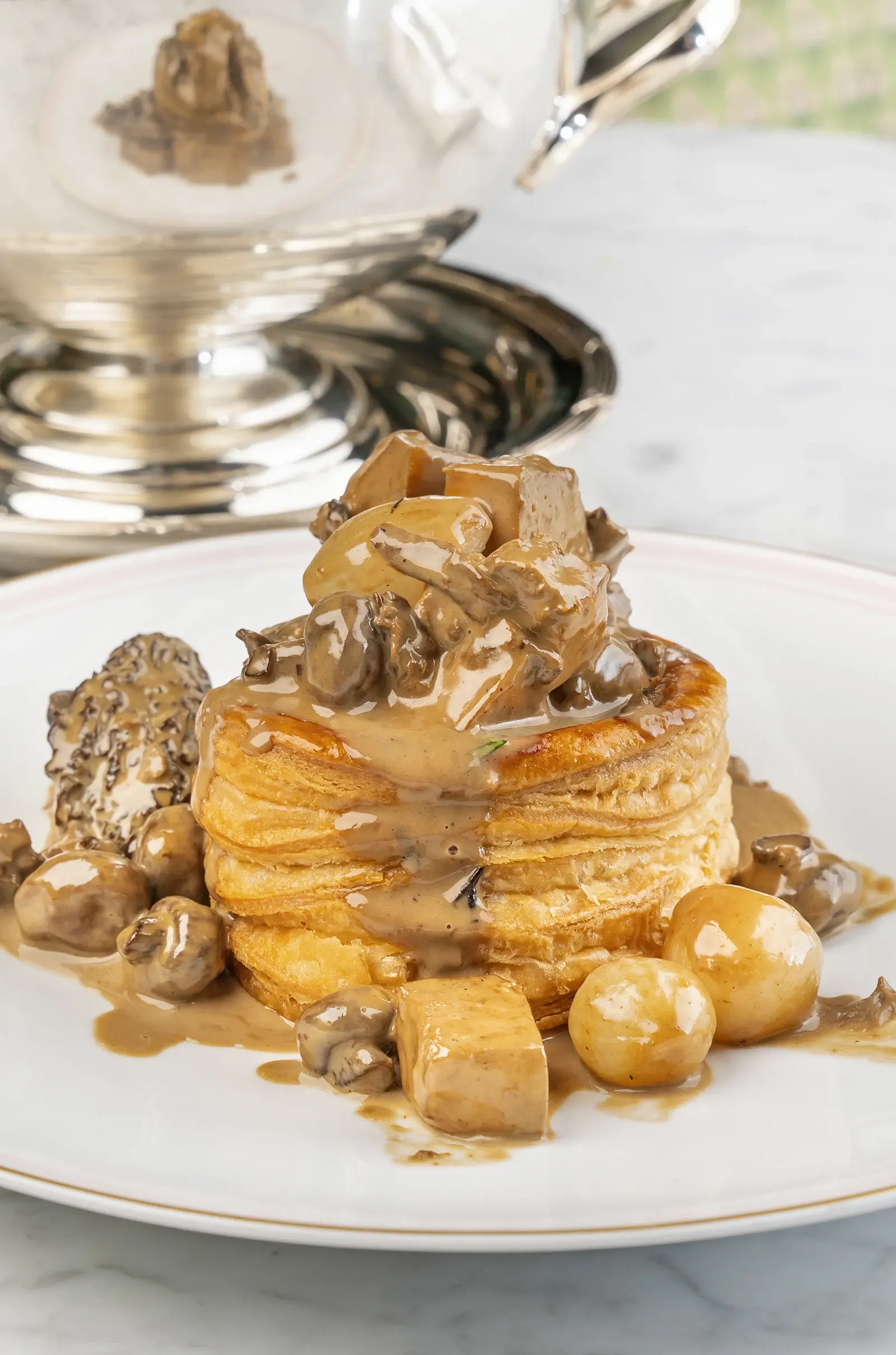 A large puff pastry case filled with a creamy mushroom and chicken mix.