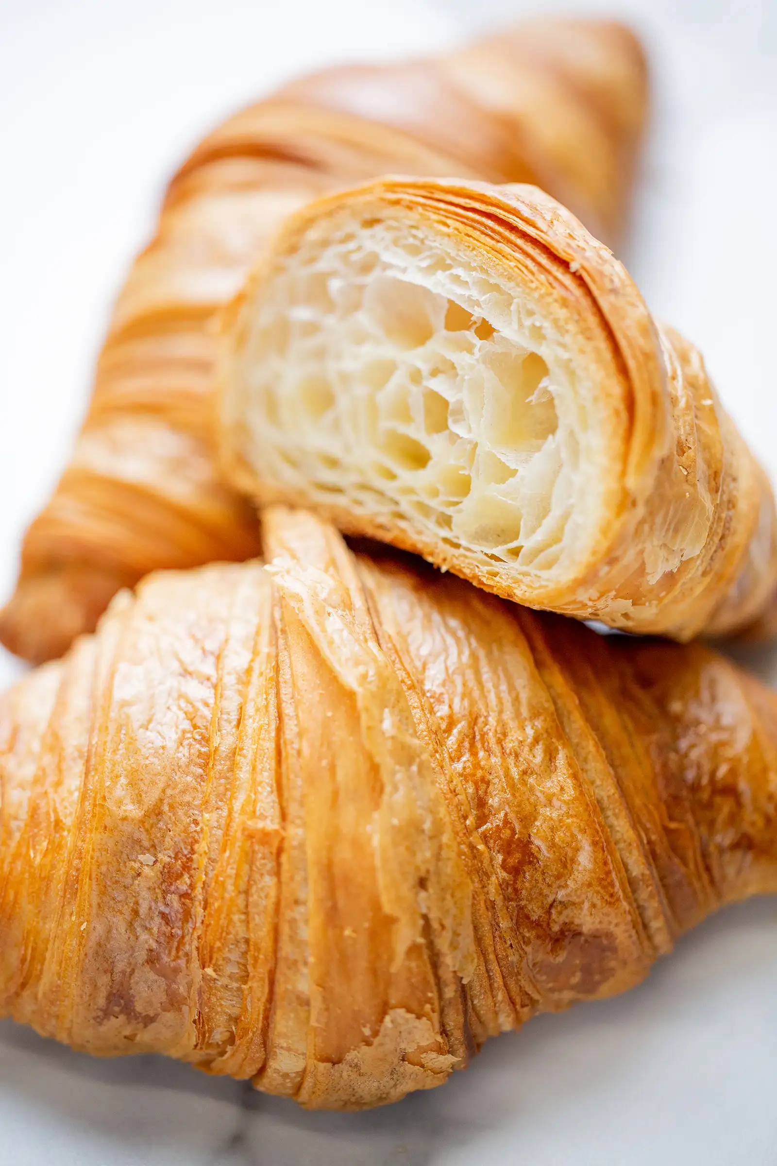 A small croissant topped with zaatar spice.