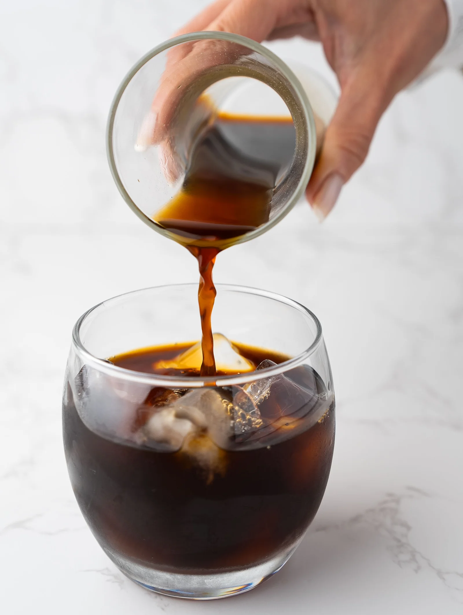 A glass of iced cold brew coffee.